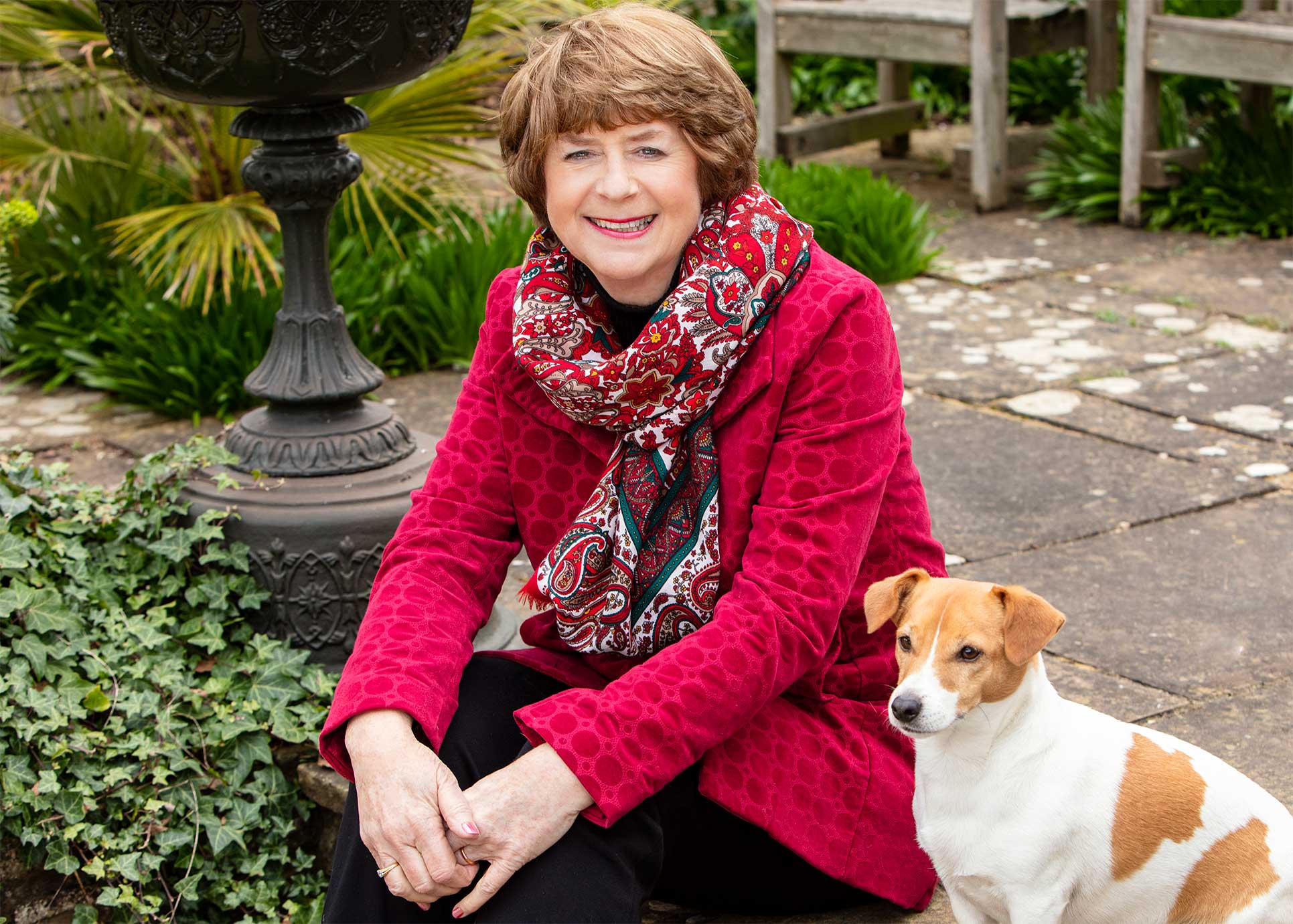 Pam Ayres sat in the garden